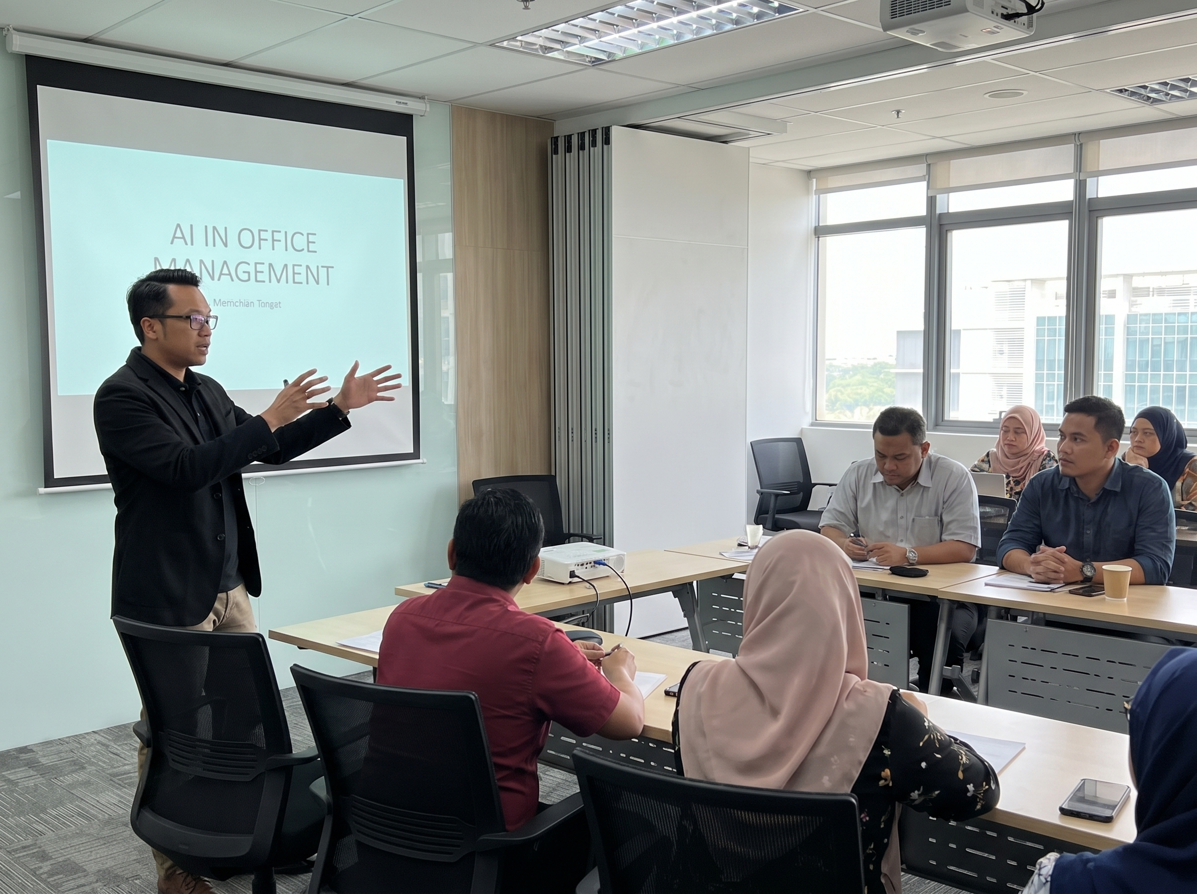 Arez Tech conducting an AI training session in a professional workshop setting.